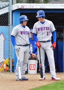 Ethan Nicodemus (left) and Tanner Gaff (right) share a laugh before the Wildcats first at bat.