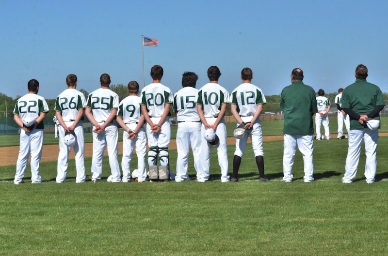 Wawasee stands ready for the first pitch during the playing of the national anthem.