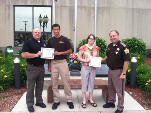 (From left) Sheriff Rocky Goshert, Zarek Finley, Meghan Boston and Captain Aaron Rovenstine. (Photo provided by Chad Hill KCSD)