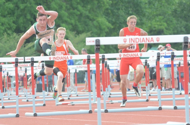 Clayton Cook flies to second place in his 110 hurdles prelim race. Cook went on to place fifth in the finals of the event Saturday at Indiana University.