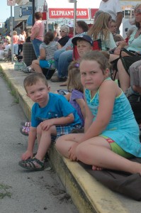 Alyssa FInley, Landon Jagger and Claire Jagger anxiously awaits the start of the parade