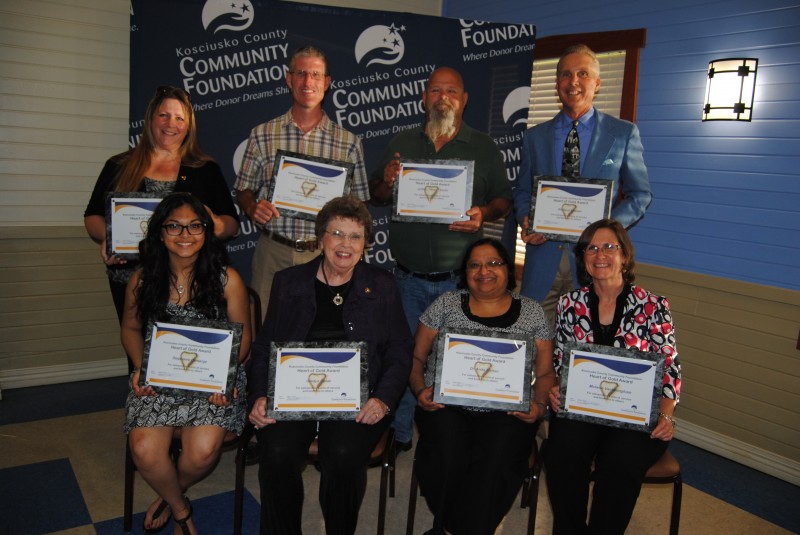 Ten individuals were honored with a Heart of Gold June 5 in Warsaw. The awards are presented by Kosciusko County Community Foundation. Pictured, in the front row, from left, are Stephanie Camargo, Gladys Deloe, Dr. Anita Kishan and Melanie Vanlaningham. In back are Ami Pitt, Scott Nelson, Jeffrey “Hoss” Smith and Richard Keeven. Not pictured are Jason Farmer and Al Disbro. (Photo by Phoebe Muthart)