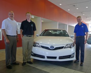 Nate Bosch (middle), director of the Center for Lakes & Streams at Grace College, accepts grant from Toyota Motor Sales, U.S.A., Inc. with Gabe Douglas (left), sales manager at Toyota of Warsaw, and John Rice (right), general manager at Toyota of Warsaw.