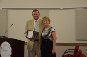 Deb Blatz, director of special services, was honored for her 32 years of service with WCS by Dr. Craig Hintz. Blatz is retiring from the corporation effective June 30.  (Photo by Alyssa Richardson)