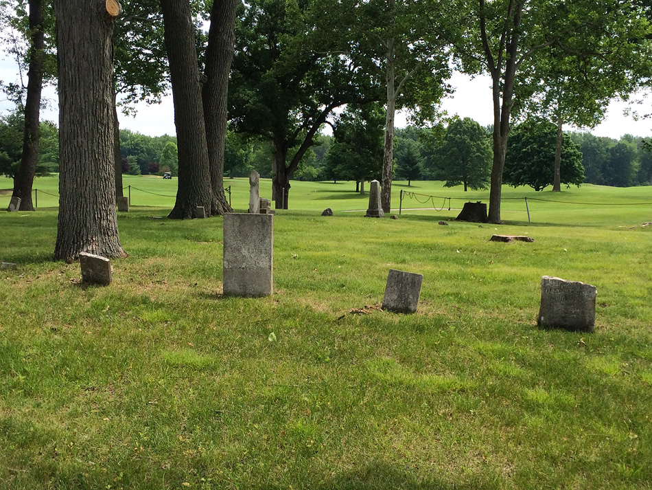 A cemetery, uncommonly placed smack dab in the middle of the golf course, sits unaltered along the ninth fairway.