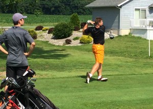 Luke Johnson of Warsaw tees off on number three.