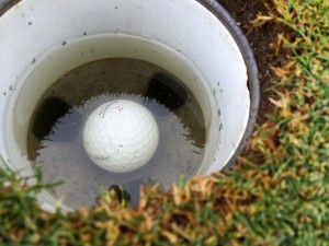 Standing water in the cup on number two just added to the poor performance on the hole.