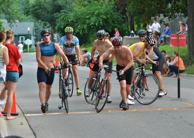 A group of triathletes finish the bike portion of the triathlon on Saturday morning. (Photos by Nick Goralczyk)