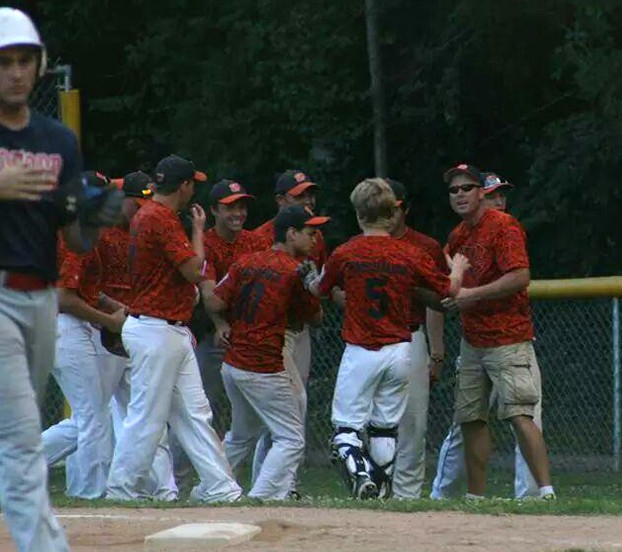 The Warsaw Senior Little League celebrates after defeating Bedford, 4-1, Wednesday night at the Indiana State baseball tournament. (Photos provided)