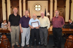 Raymond Hartman was honored during the county commissioners meeting Tuesday as Veteran of the Month for July. From left are Brad Jackson, commissioner; Rich Maron, veteran services officer; Hartman, and Bob Conley and Ron Truex, commissioners.