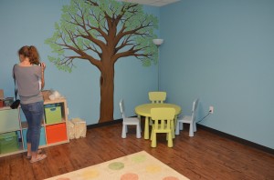 The kids' room, which has been adopted by donors and furnished, will allow children a play and study area of their own in the shelter.  (Photo by Alyssa Richardson)