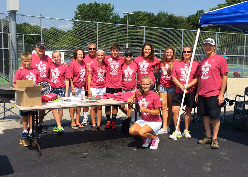 Warsaw Community High School senior Camille Kerlin, kneeling in front, is surrounded by her support team at the first running of the Racquets For Riley tennis event Saturday at WCHS. (Photo by Mike Deak)