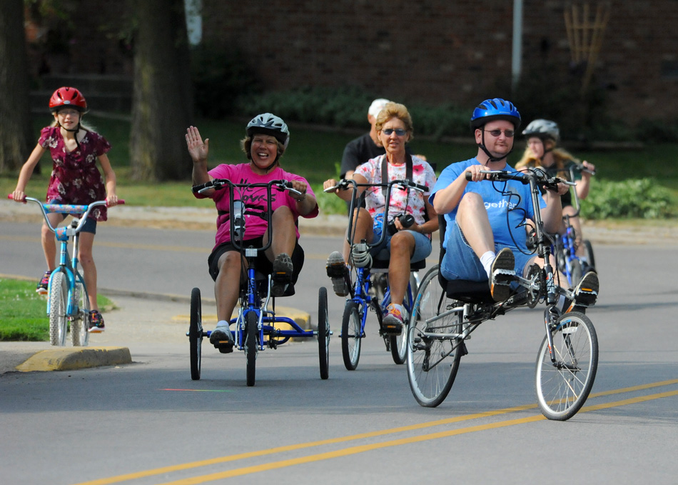 A group of riders including Leslie Wheat, Renee Wheat, Dave Elliott, Carolyn Elliott, Mike Wheat and Leslie Wheat hit the streets as part of the Tour des Lakes and Tour des Parks bike rides Saturday in greater Syracuse.