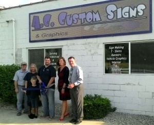 (From left) Dale Custer, Superior Excavating; Marissa Custer, A.C. Custom Signs; Dominoe Custer, A.C. Custom Signs; Adam Custer, A.C. Custom Signs Owner; Renea Salyer, Kosciusko Chamber VP of member relations; Mark Dobson, president and CEO Kosciusko Chamber. (Photo provided)