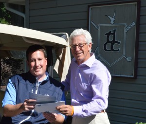 Ron Smock, right, chairman of the 2014 Steve Dodds Charity Golf Tournament for the Cancer Care Fund of Kosciusko County, makes sure Matt Funkhouser, head golf professional and Tippecanoe Lake County Club, has plenty of entry forms for this years event. The golf tournament will return to Tippecanoe Country Club on Monday, Sept. 8. Teams will have a choice between an 8 a.m. or 1 p.m. tee time. (Photo by Deb Patterson)