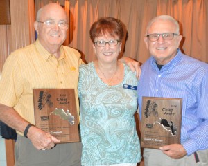 Al Campbell, left, and Dan Berkey, right, were presented the 2014 WPOA Wawasee Chief Award by Kay Young, WPOA president. (Photo by Deb Patterson)