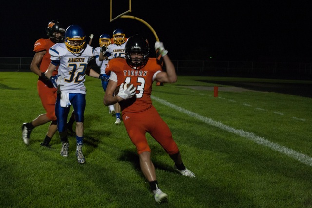 Brock Riley hauls in the game winning two-point conversion for the Tigers (Photo by Ansel Hygema)