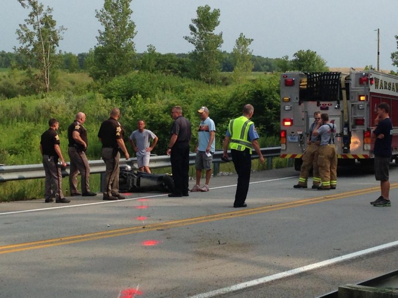 Investigating the scene of a motorcycle accident south of Warsaw. (Photo by John Faulkner)