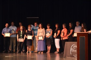 Teacher of the Year Nominees stand on-stage during the awards ceremony.  (Photo by Alyssa Richardson)