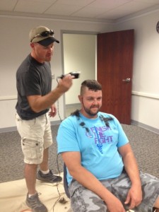 Noble County Relay for Life co-chair Michael White promised to shave his head if this year’s teams raised more than the $40,000 goal. His son Conner was one of those who got the chance to shave his dad’s hair. (Photos provided)