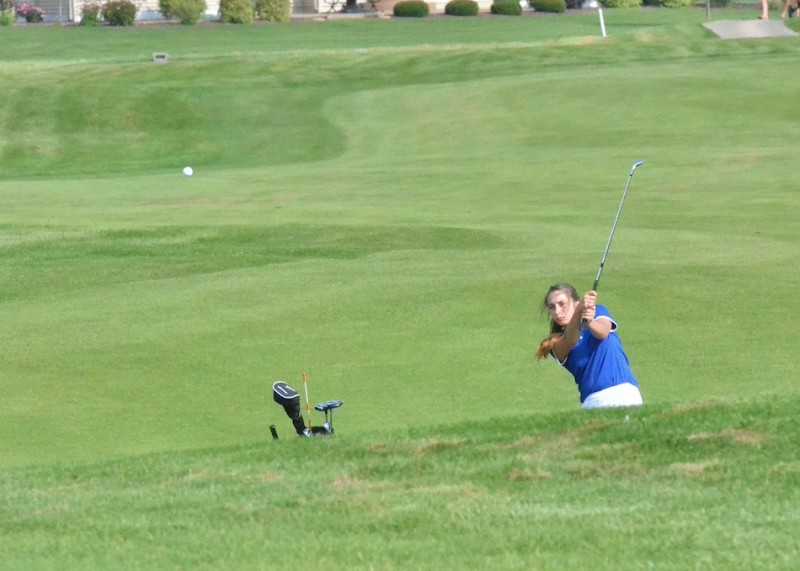Triton's Kayla Kraft hits on to the number one green at Stonehenge. (Photos by Nick Goralczyk)