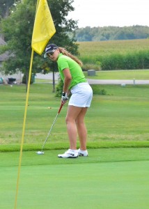 Mikala Mawhorter sets up before sinking a putt for eagle at South Shore Golf Club. (Photos by Nick Goralczyk.)
