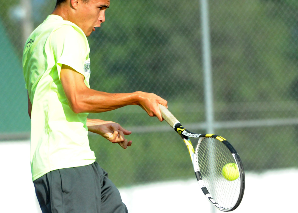 Nate Haines follows through on a shot against Central Noble in the two singles matchup.