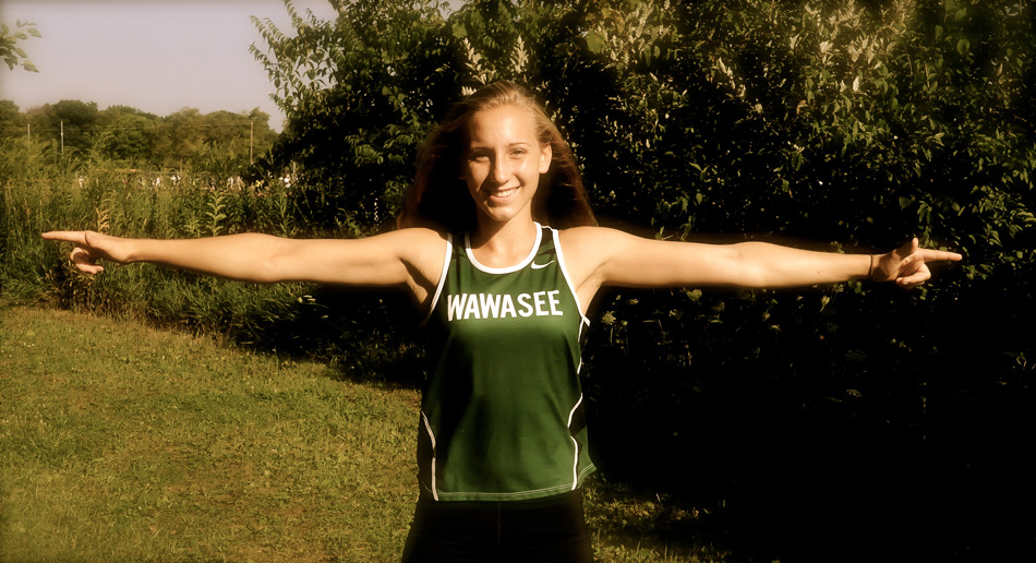 Wawasee senior Sarah Harden looks to point her Lady Warrior cross country teammates in the right direction. (Photo by Mike Deak)