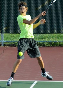 Todd Hauser fires a shot at Central Noble in the one doubles match Tuesday night. (Photos by Mike Deak)