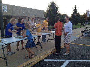Pictured serving ice cream to members of the PJ Hanley family are: Terri Barnhart, Diana Westphal, Louise Mason, Travis Barnhart and Ken Barnhart. (Photo provided)