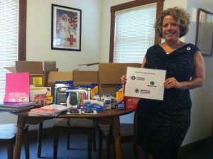 The American Red Cross, represented by Kim Komdeur, and Dollar Tree have teamed up to donate over 1,700 school supplies to Combined Community Services' Tools for School Program. 