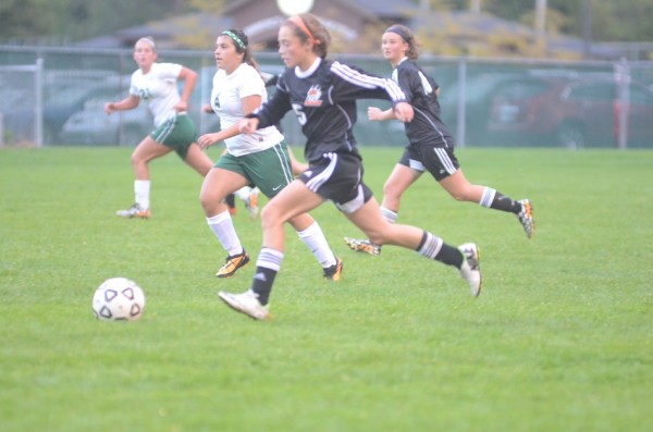 Brenna Shipley makes a run for the Tigers at Concord Thursday night.