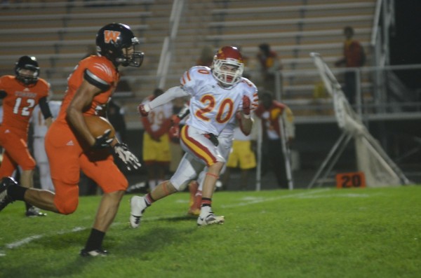 Jeremy David heads for a touchdown for the Tigers.