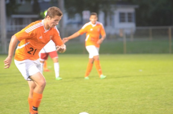 Brandon Reinholt controls the ball for the Tigers.