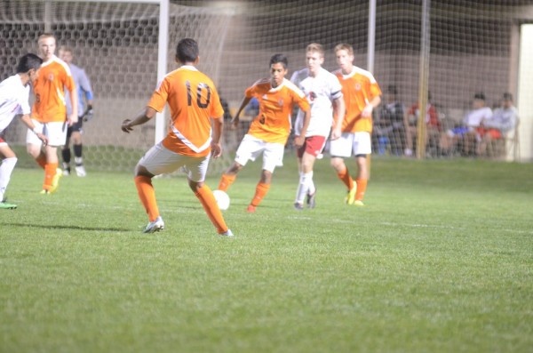 Romeo Rosales passes the ball to a teammate.