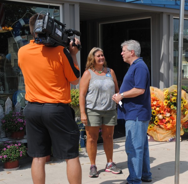 Shown on the left is Gordy Young interviewing Sue Ward, chamber president, about the festival.