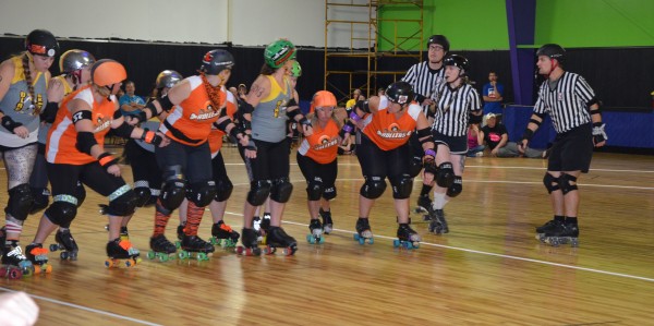 The Bone City Rollers stand ready to skate off against the Dire Skates. (Photo by Alyssa Richardson)