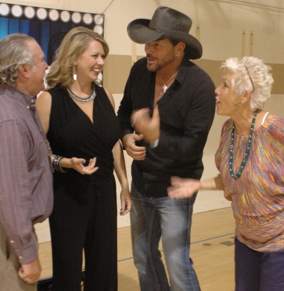 Steve Petro, left, and Kelly Petro, right, talk with Andrea and Darryl Gatlin. (Photo by Deb Patterson)