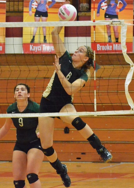 Meghan Fretz goes up for one of her seven kills on the night. (Photos by Nick Goralczyk)