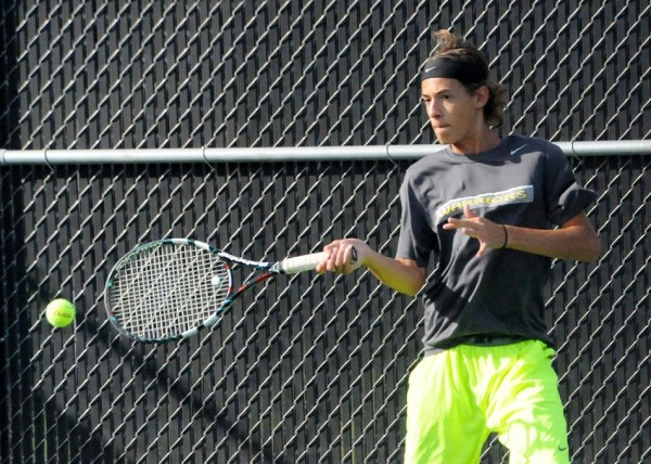 Todd Hauser of Wawasee returns a shot during action in the conference tourney at Warsaw.