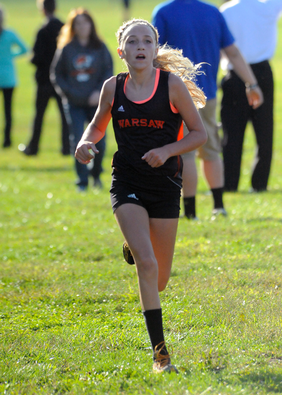 Warsaw's Mia Beckham was the best of the bunch Tuesday in the dual with Wawasee, winning with a time of 20:11. (Photos by Mike Deak)