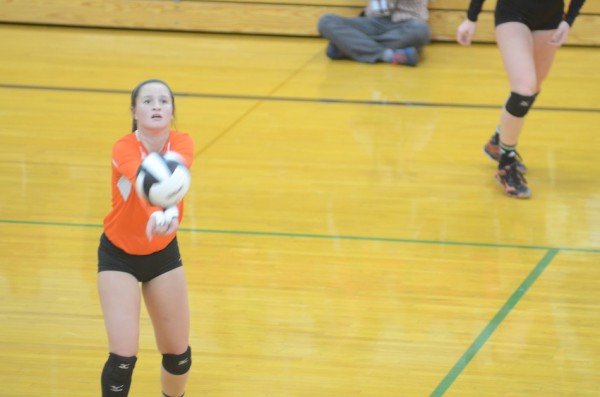 Libebo Peyton Adamiec makes a pass for the Tigers.