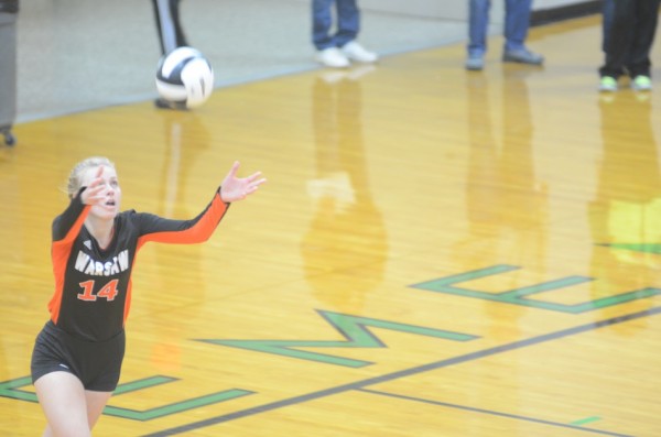 Katie Voelz prepares to serve in sectional play Thursday night. The Warsaw senior standout saw her prep career come to an end Saturday.