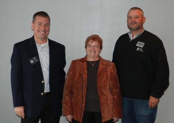 Rick Wajda, Indiana Builders Association Chief Executive Officer, congratulates Joni Truex, Builders Association Kosciusko Fulton Counties Executive Officer, and BAKFC Board President Brett Harter CGP, Freeman & Harter Custom Homes, and IBA Builder Area VP on earning first place in the IBA Pride of Leadership Contest.
