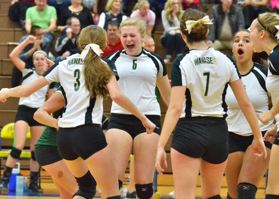 Ashley Beer (5) and the Lady Warriors celebrate a point later in game two against NorthWood. (Photos by Nick Goralczyk)