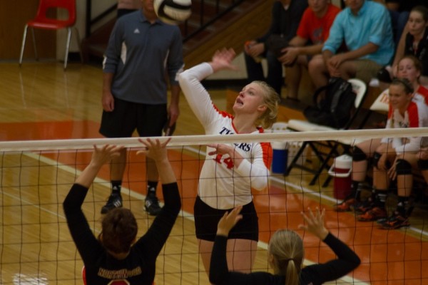 Senior Katie Voelz goes up for a kill attempt for Warsaw in a 3-1 home win over NorthWood Thursday night (Photos by Ansel Hygema)