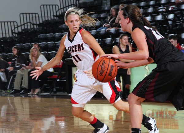 Gabby Bryant plays defense for Grace College Saturday. The Lancers opened their season with a 53-44 home win over Holy Cross (Photo provided by the Grace College Sports Information Department)