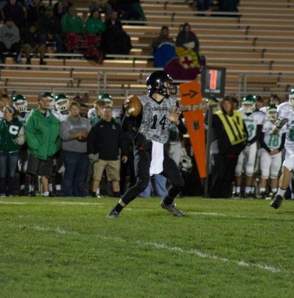 Warsaw quarterback Jake Mangas will look to lead the Tigers to a sectional win Friday night at home (File photo by Ansel Hygema)