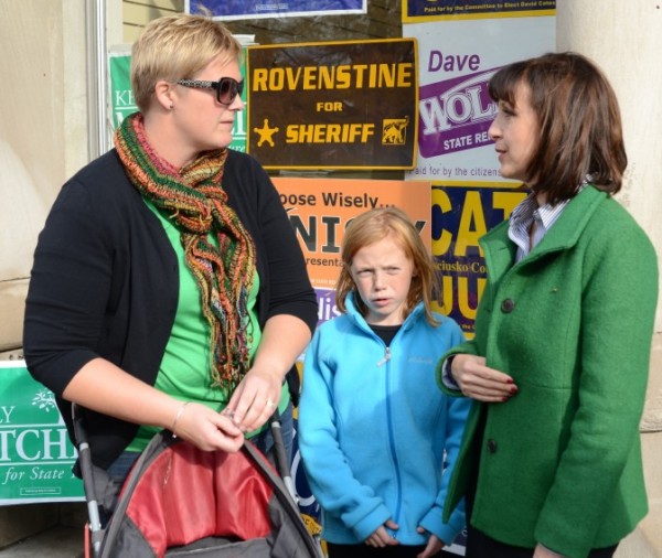 Allison McSherry takes a moment to speak with Kelly Mitchell, candidate for treasurer of state. Maddie McSherry is shown in the middle. (Photo by Deb Patterson)