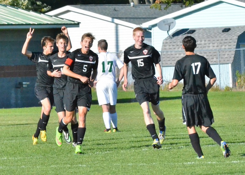 NorthWood players celebrate after taking a 2-0 lead over Wawasee in the first half of Wednesday's sectional semi-final in Plymouth. (Photos by Nick Goralczyk)